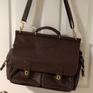 Coach Travel Collection has CU initials on front.